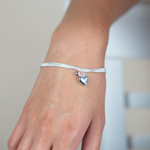 Silver Plated Triple Chain Bracelet with a Silver Plated Heart and a Rose Gold Heart