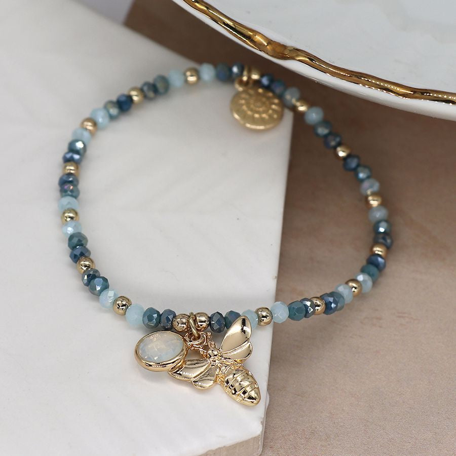 Blue bead bracelet with gold bee and crystal