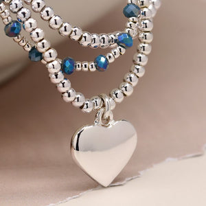 Silver plated and blue bead bracelet with heart charm