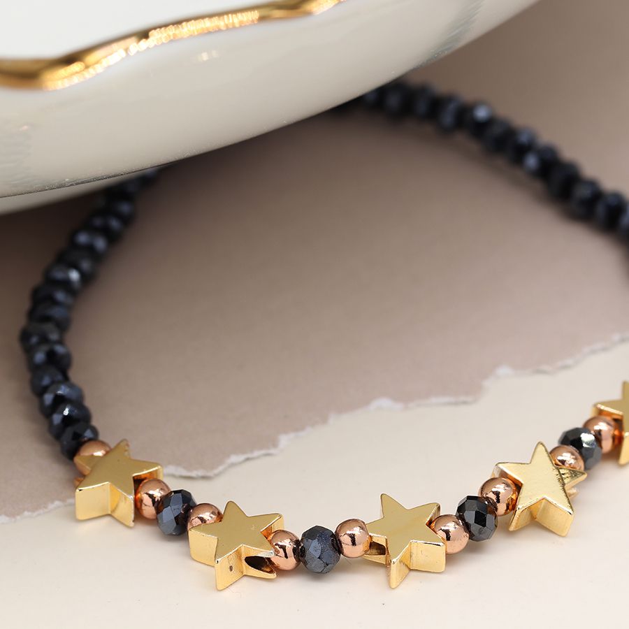 MIDNIGHT BLUE SPARKLE BEAD BRACELET WITH FAUX GOLD STARS