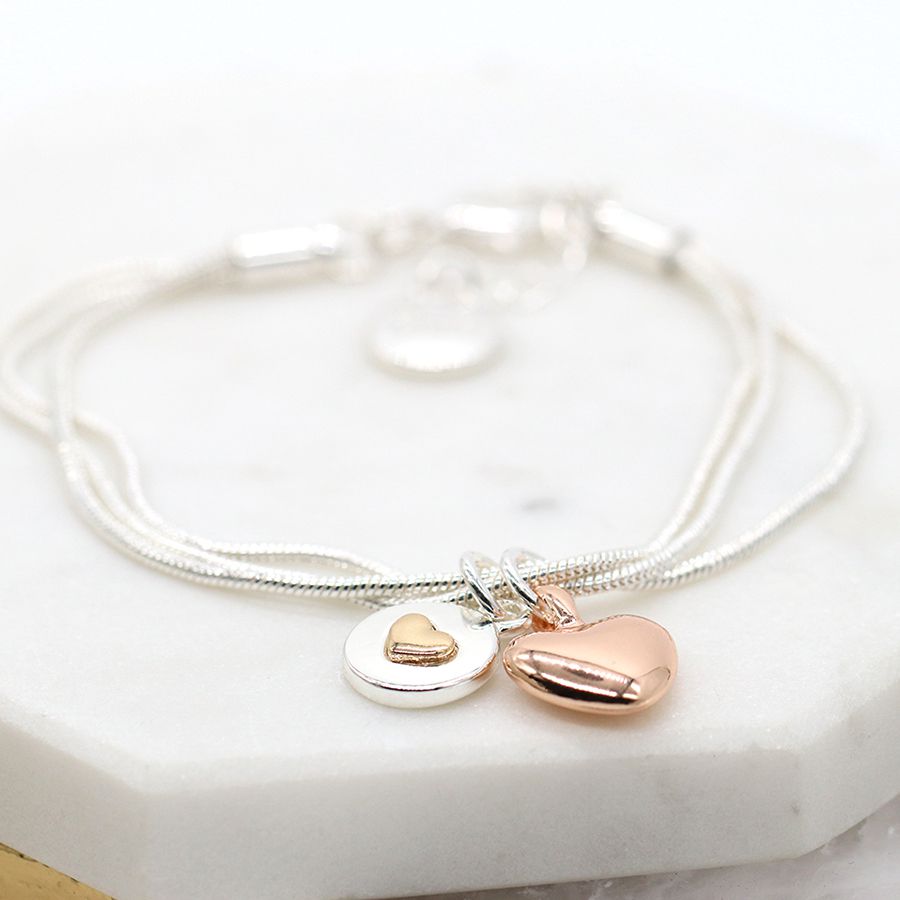Silver plated and rose gold double heart charm bracelet