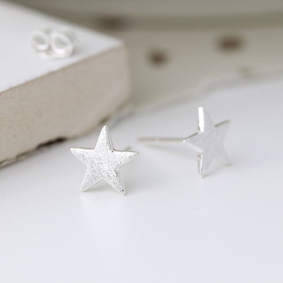 Sterling silver scratched star earrings