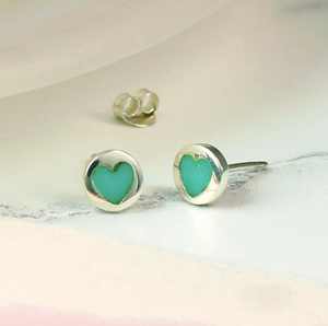 Sterling silver round stud earrings with turquoise heart inset