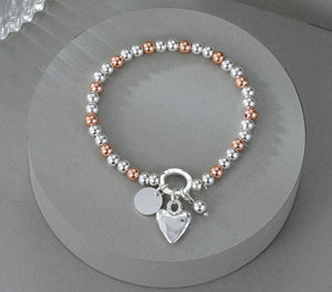 Silver and Rose Gold Heart Bracelet