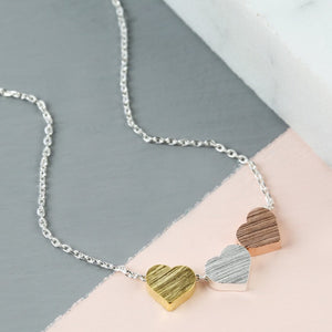 MIXED METAL TRIPLE HEART NECKLACE WITH SILVER CHAIN